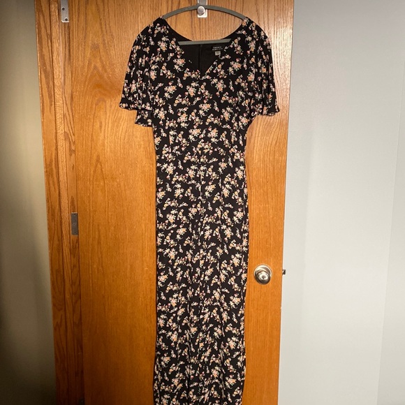 Never worn Tahari jumpsuit, size 16. Black with floral design. Ties in back. - Picture 1 of 6